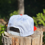 Red and white ball cap